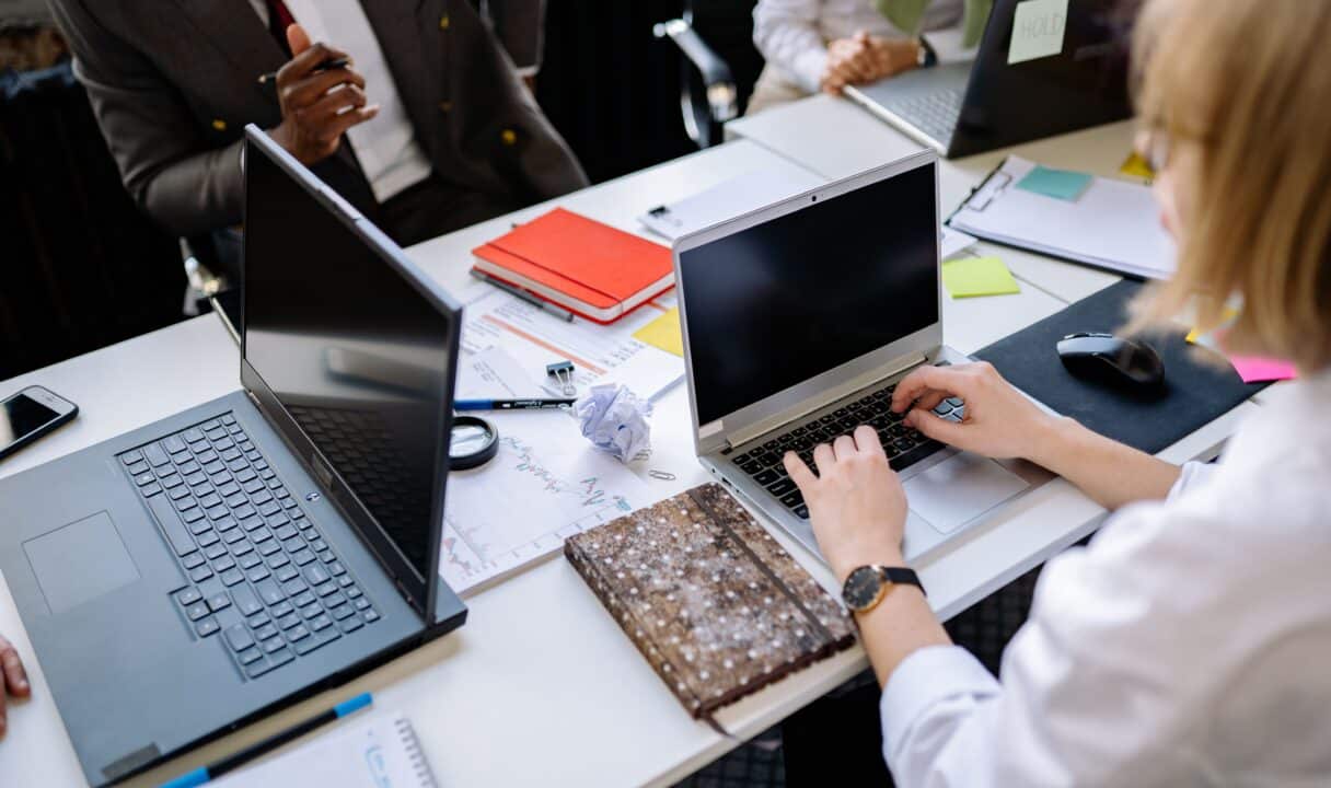 team reviewing types of working hours and schedule planning in a company